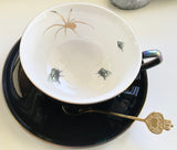 LARGE CAPACITY Patinaed Spider and Fly Cup & Saucer Set