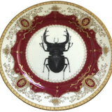 Vintage maroon and gold stag beetle plate or cup and saucer set, porcelain