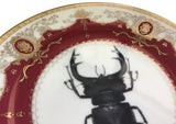 Vintage maroon and gold stag beetle plate or cup and saucer set, porcelain