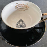 Jumbo Ouija board and planchette cup and saucer set