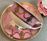 DELICATE PINK TEACUP AND SAUCER SET