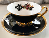 Black and gold floral skeleton key teacup and saucer set with spoon, 8 ounces, porcelain