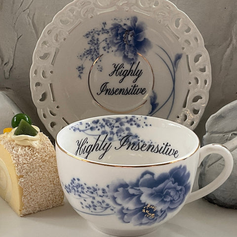 "Highly Insensitive" teacup and saucer set with spoon, 7 ounces