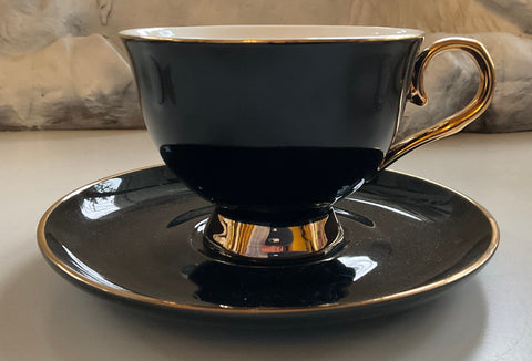 Black and gold occult teacup and saucer set with spoon, 8 ounces, porcelain