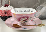 “You can’t sit with us” porcelain teacup and saucer set with spoon, 8 ounces