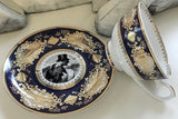 "Man With Raven" Plate or Teacup & Saucer Set, Porcelain